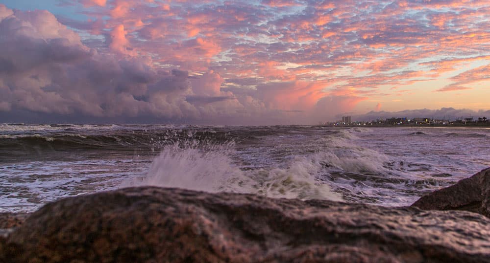 Ocean waves crashing onto a rocky beach